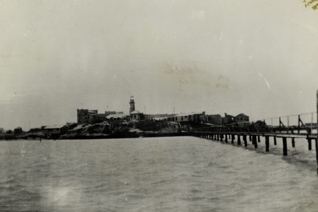 1947 image from a real photo postcard taken from the Laguna Madre Bay towards Port Isabel and Purdy's Courts.