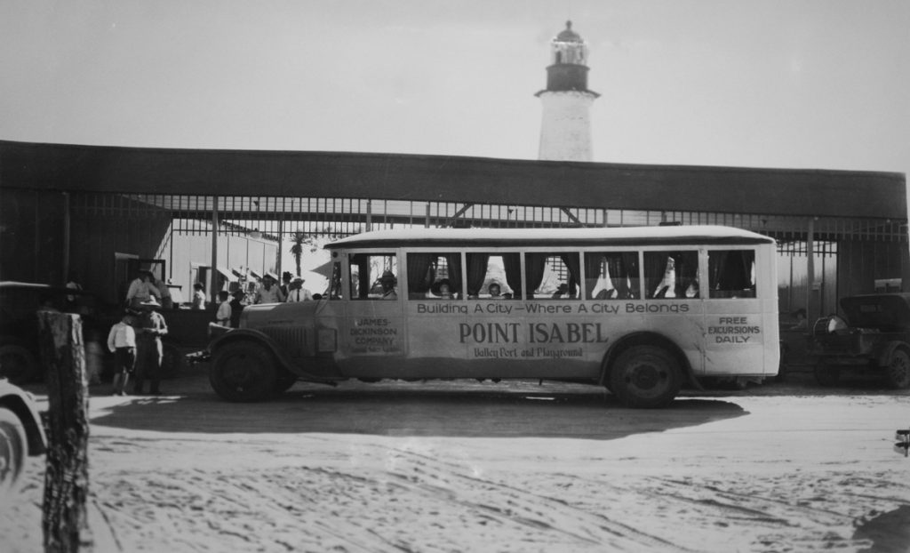 The James-Dickinson Co., Realtors customized buses emblazoned with a bold message... "Building A City -- Where A City Belongs", POINT ISABEL, Valley Port and Playground". With free excursions daily from points in the west end of the Rio Grande Valley, buses arrived in Port Isabel loaded with potential buyers. Some of which are pictured in the very top of the Lighthouse.